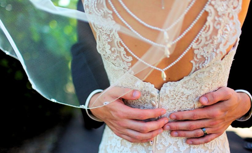 closer details of bride's gown
